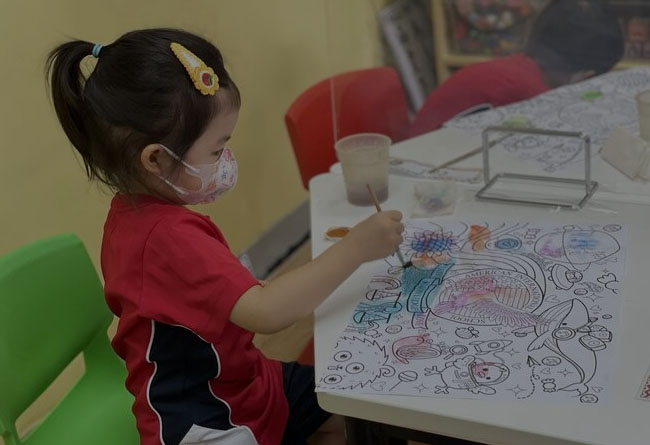 Young child painting