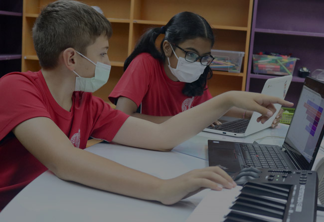 Students doing music composition